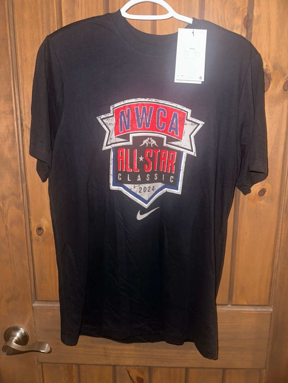 Nike t-shirt is a 2024 NWCA All-Star Classic wrestling event t-shirt